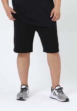 Plus size plain cotton sweat shorts in black color.