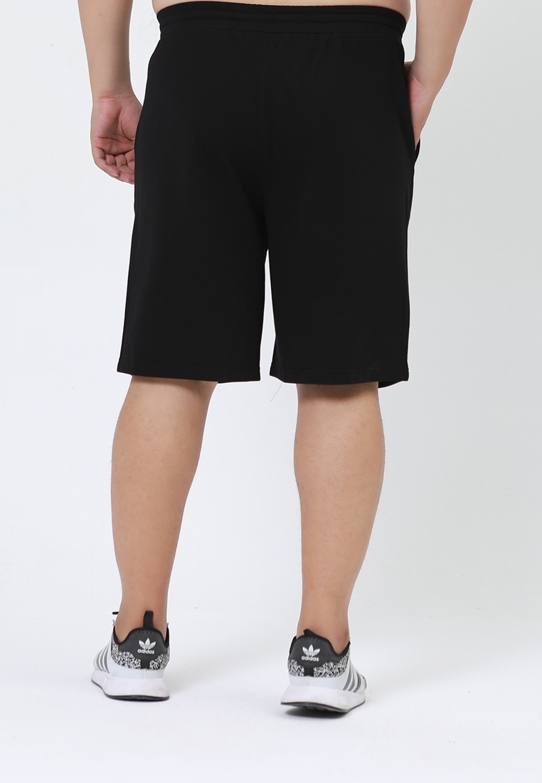 Back view of Plus size plain cotton sweat shorts in black color.